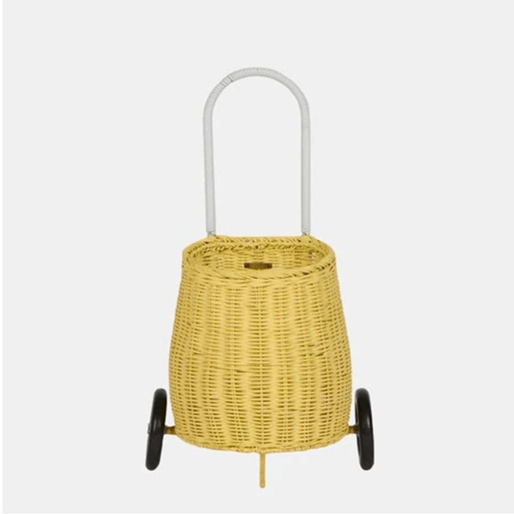 EUC Olli Ella Rattan Luggy - Yellow wicker basket with wheels.